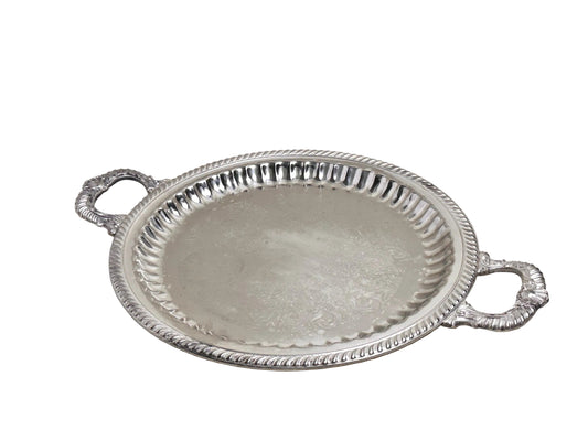 Silver tray with handles on a light gray background